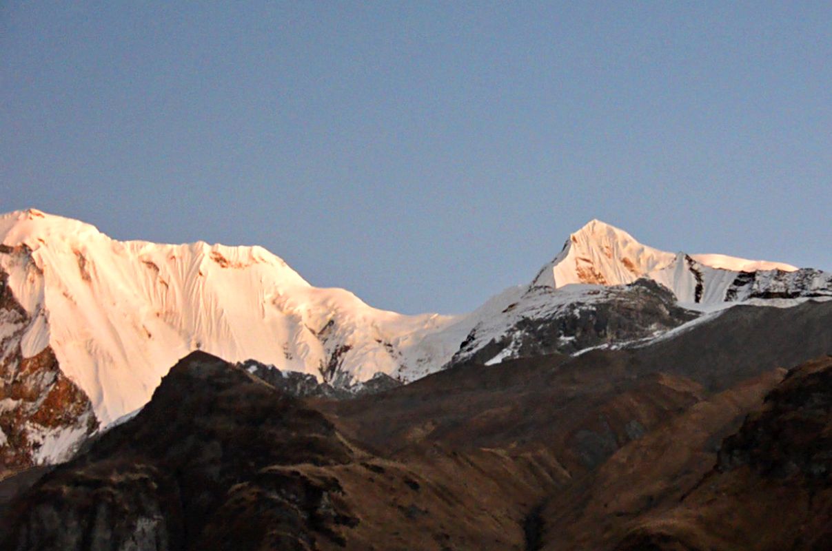 10 Roc Noir Kangshar Kang And Singu Chuli Fluted Peak At Sunrise From Annapurna Base Camp In The Annapurna Sanctuary 